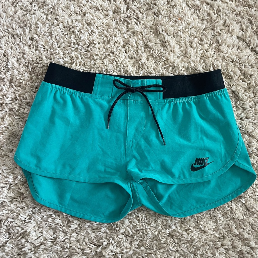 Nike teal running Athletic Shorts with Black Trim